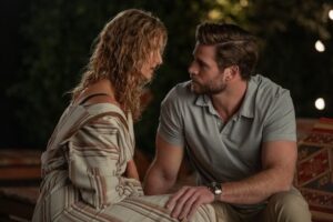 Laura Dern as Katherine Loewe and Liam Hemsworth as Owen Brophy in "Lonely Planet."