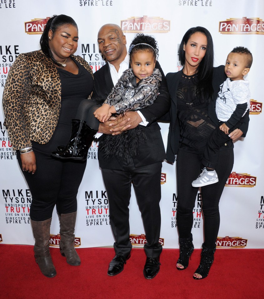 Tyson with his daughters Mikey, far left, Milan middle, wife Kiki Tyson and son Morocco, far right