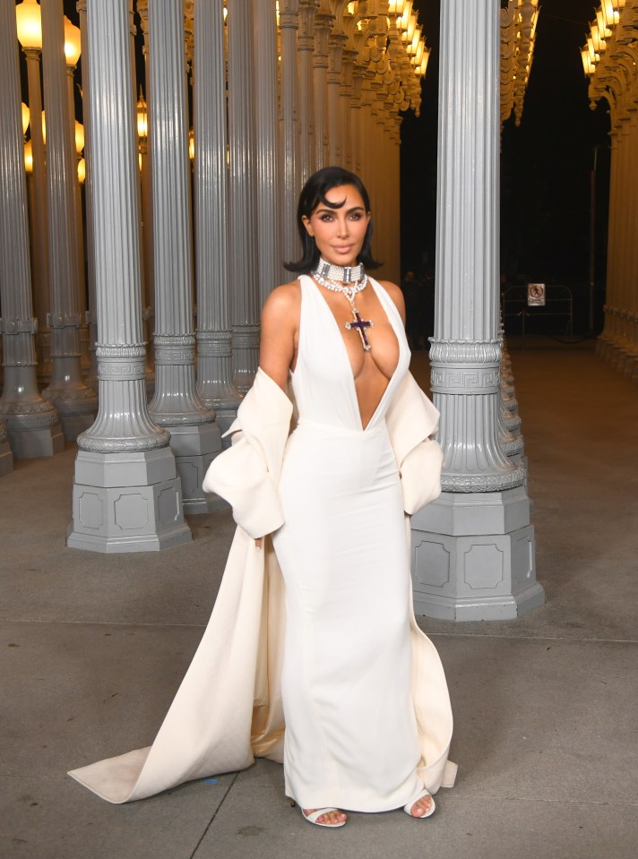 The Kardashians alumni opted for a white bodycon dress with matching ruffle cape