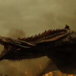 Daenerys on the back of a roaring Drogon on Game of Thrones