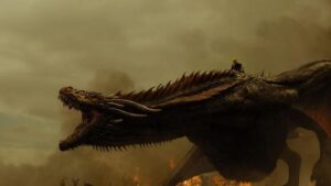 Daenerys on the back of a roaring Drogon on Game of Thrones