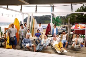 Group of men on a deck at the beach