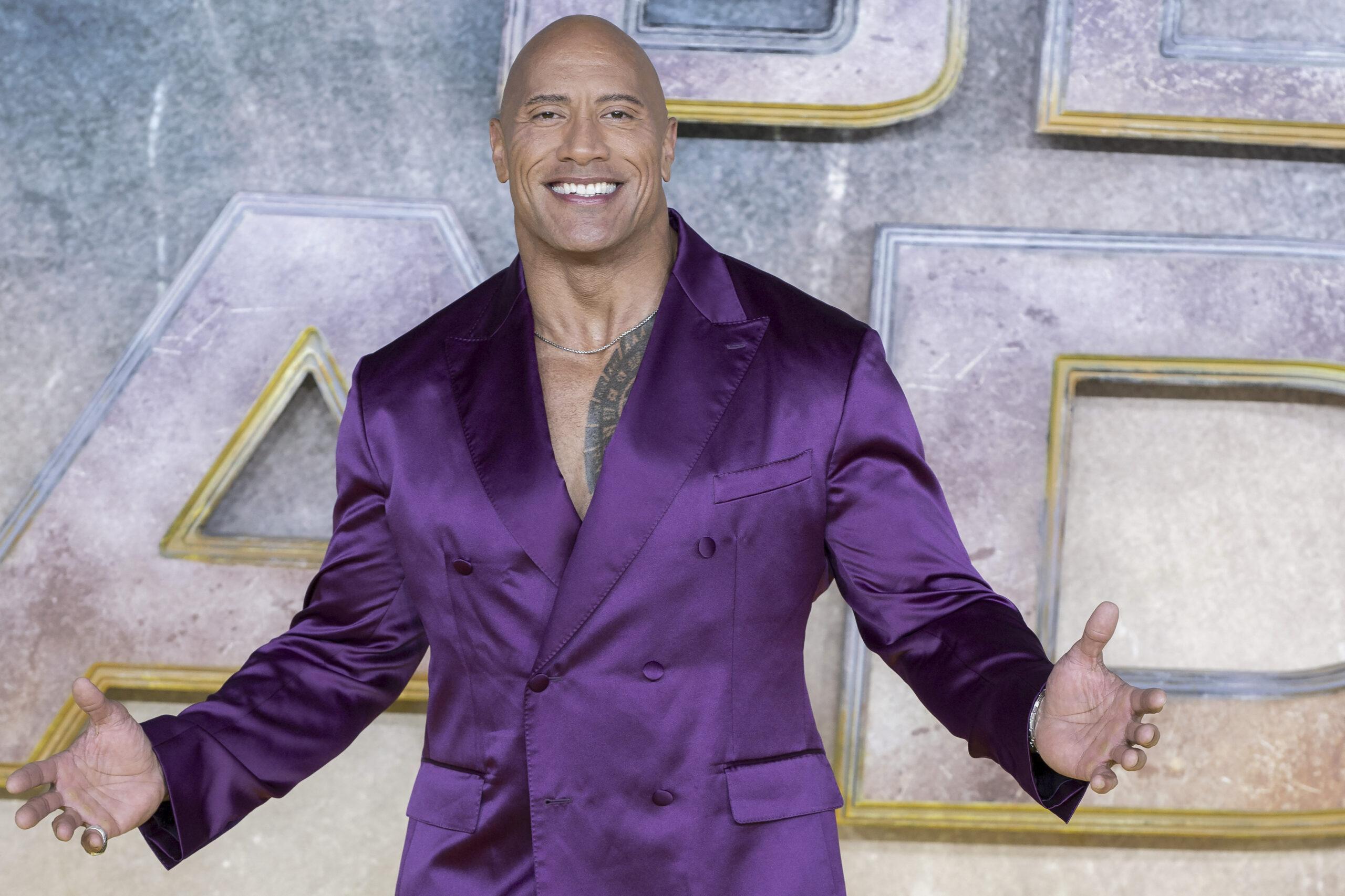 Dwayne Johnson in a purple tux