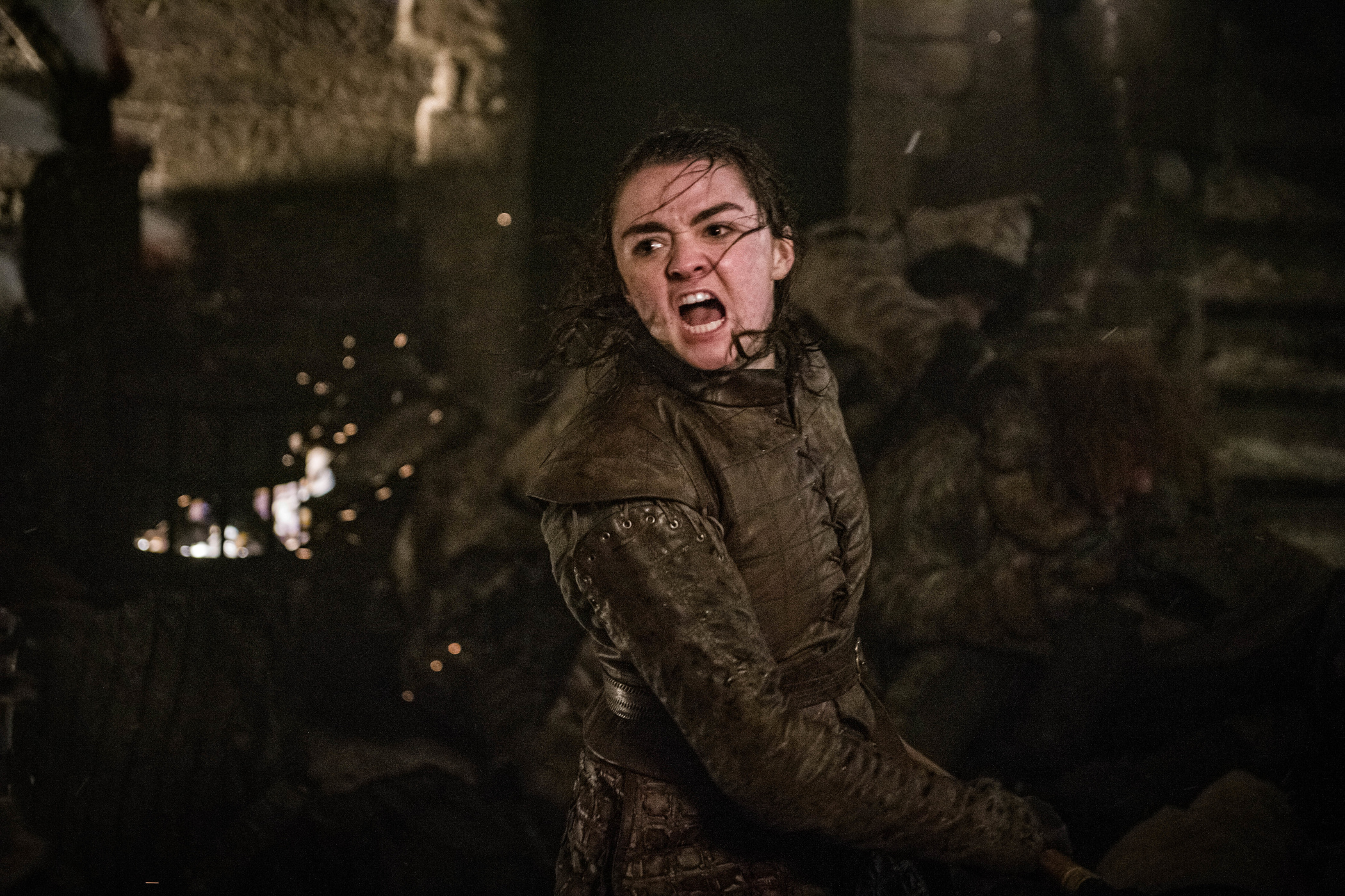 Maisie Williams as Arya Stark in the middle of a sword fight on game of Thrones