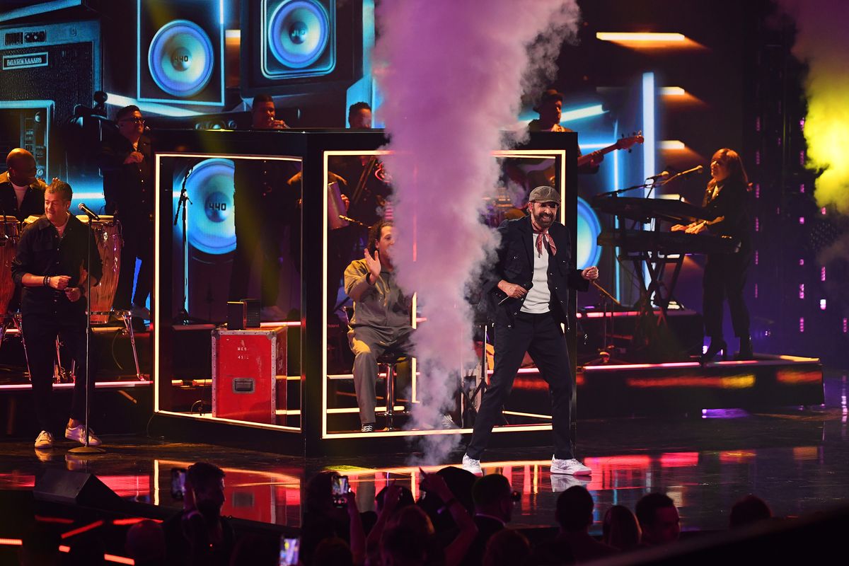 Juan Luis Guerra performs onstage during the 25th Annual Latin GRAMMY Awards 