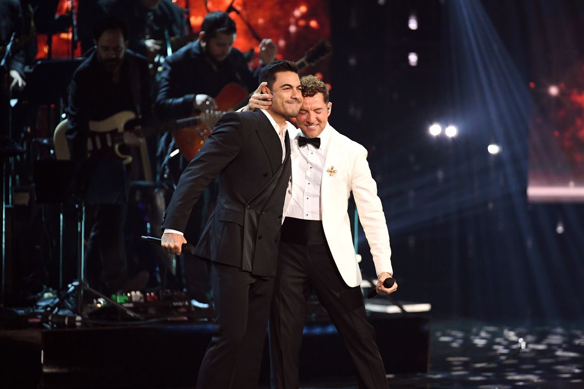  Carlos Rivera and David Bisbal perform onstage during the 25th Annual Latin GRAMMY Awards