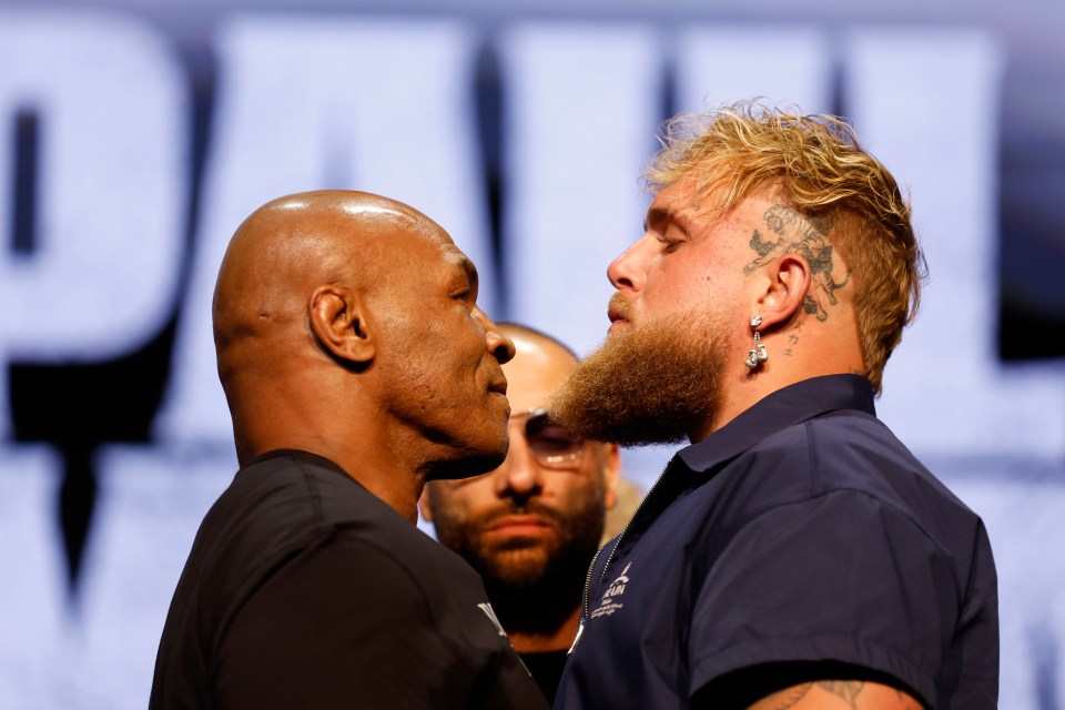 Mike Tyson facing off with Jake Paul