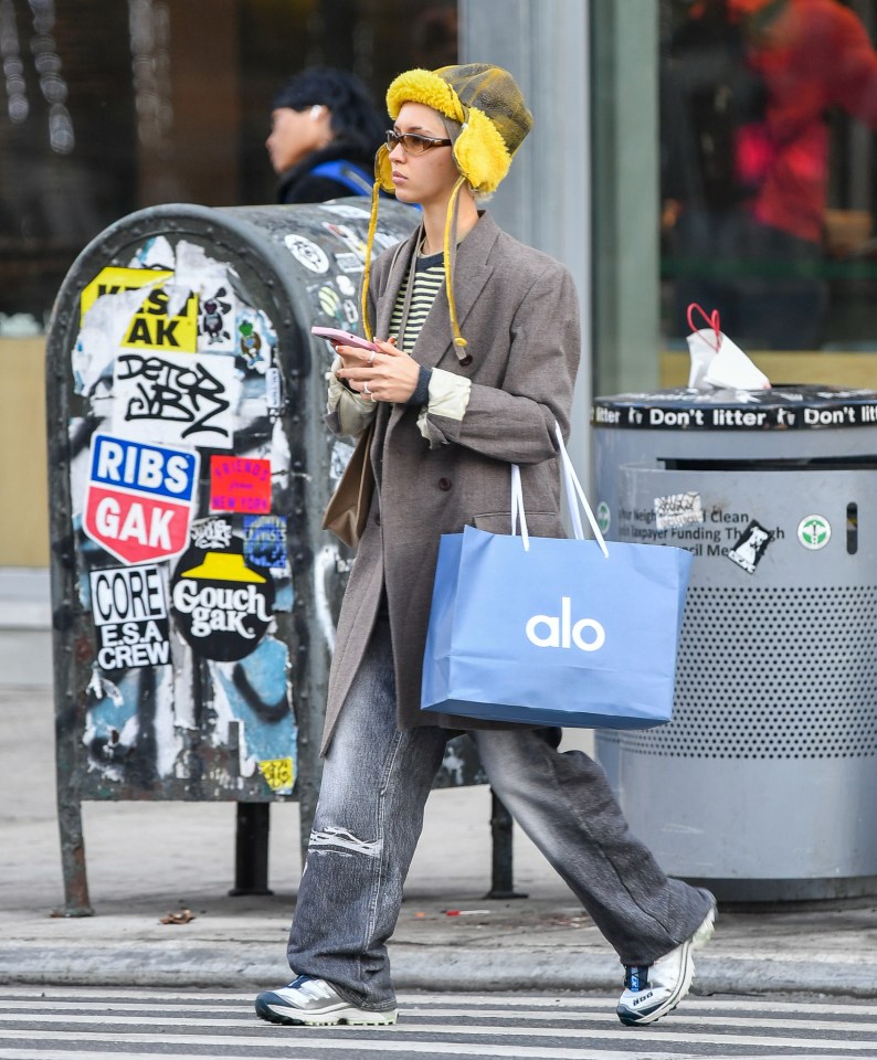 Iris Law - the eldest daughter of actor Jude - was seen with a bag from trendy sports brand Alo