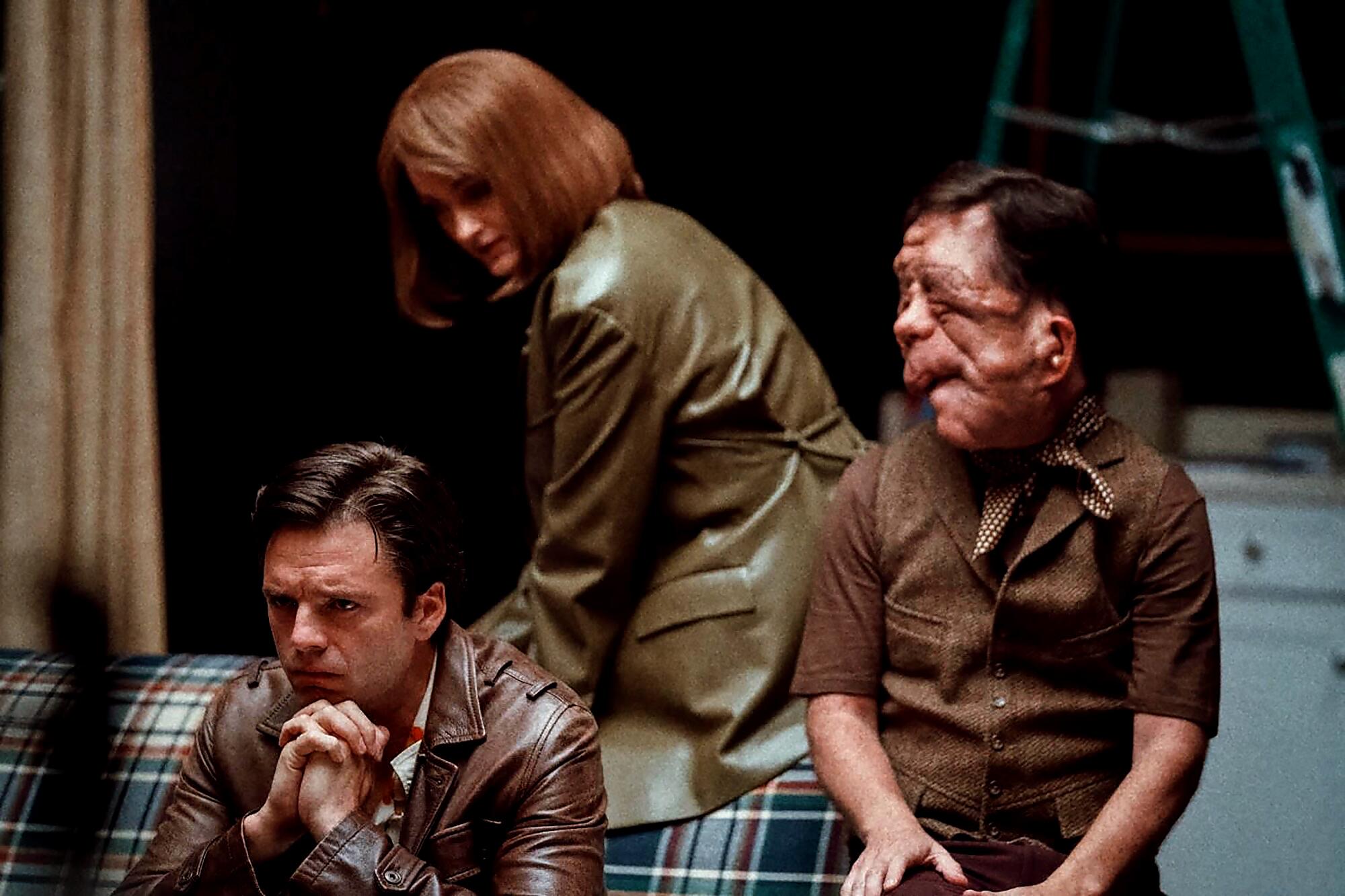 Sebastian Stan, left, stars in "A Different Man" with Renate Reinsve and Adam Pearson.