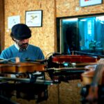 Umberto Smerilli at the piano with violins at the ready