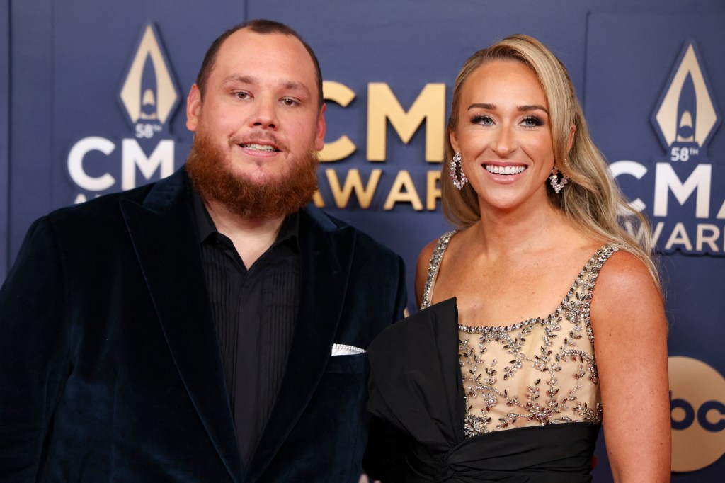 Nicole Combs and Luke Combs pose on the red carpet during the 58th Annual CMA Awards, in Nashville, Tennessee, U.S., November 20, 2024.