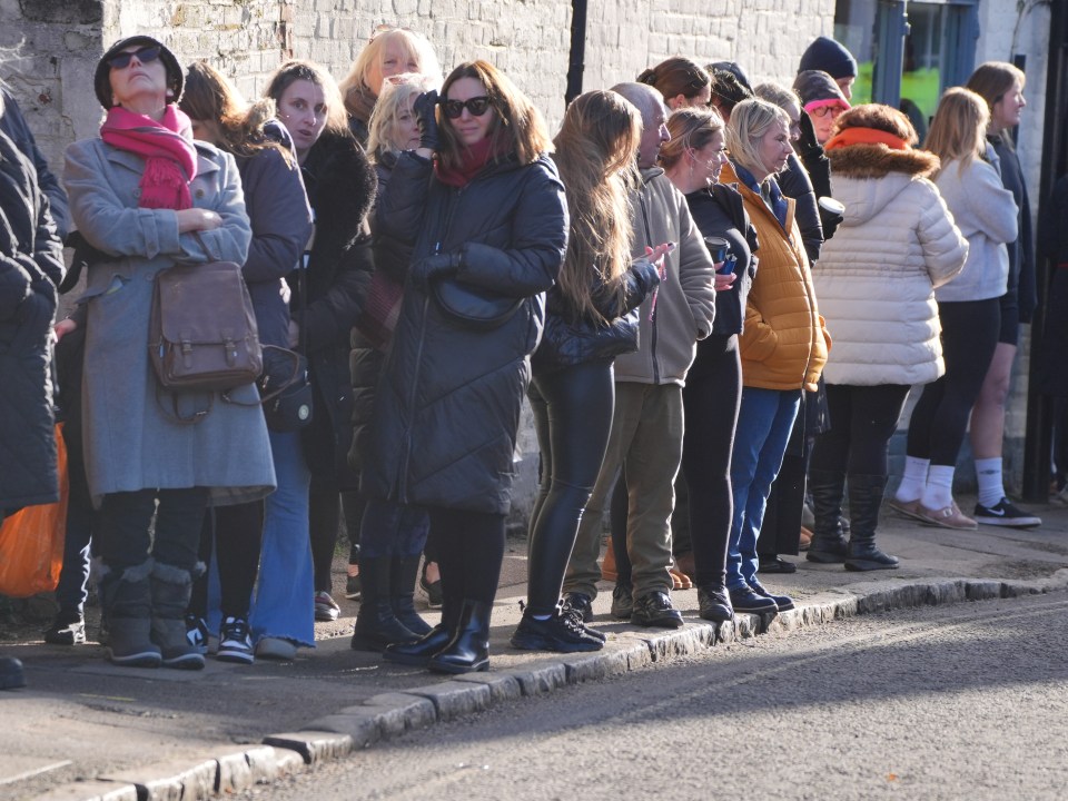 Members of the public lined the route to the funeral service