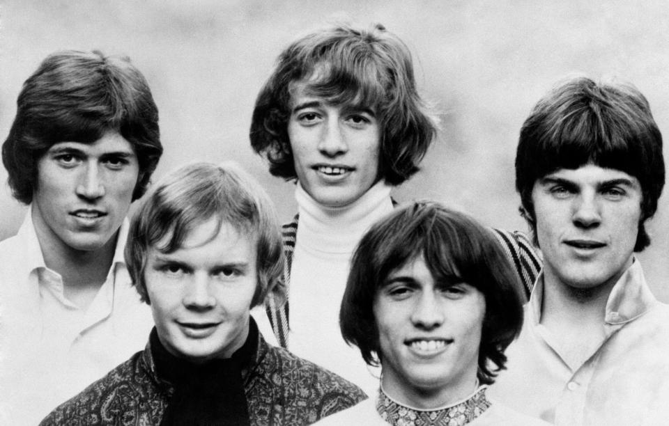 Dennis Bryon (bottom left) with his Bee Gees bandmates