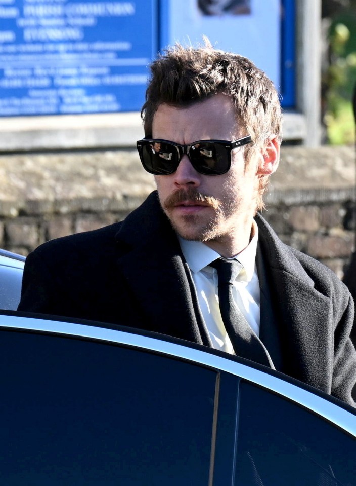 One Direction star Harry Styles arrives for the funeral service