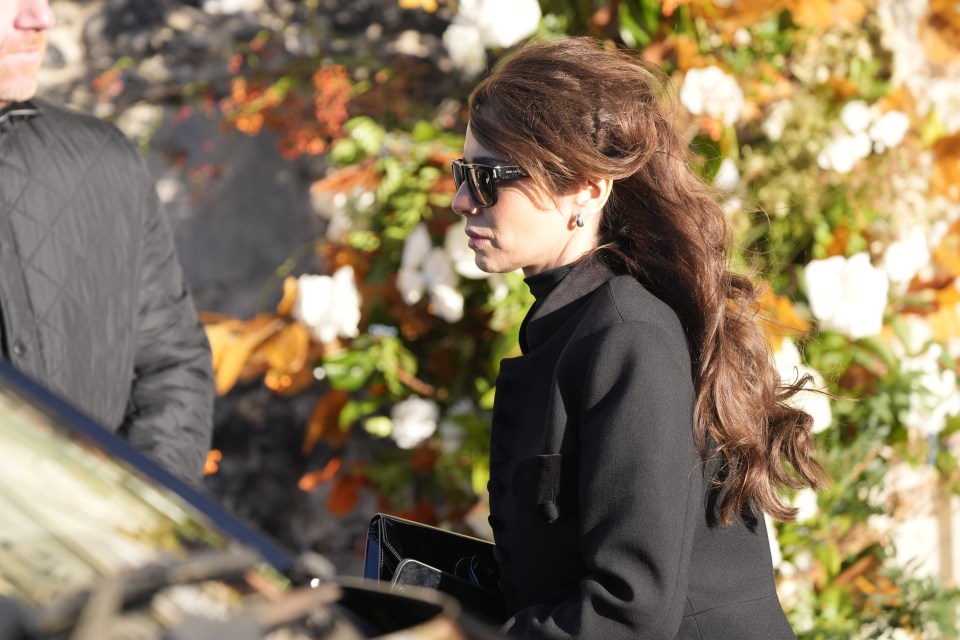 Cheryl was seen after the service wearing a black coat and sunglasses