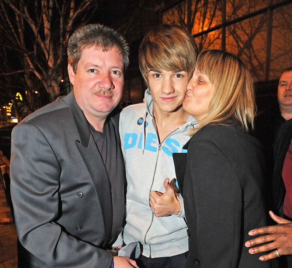 Liam with his dad Geoff and mum Karen