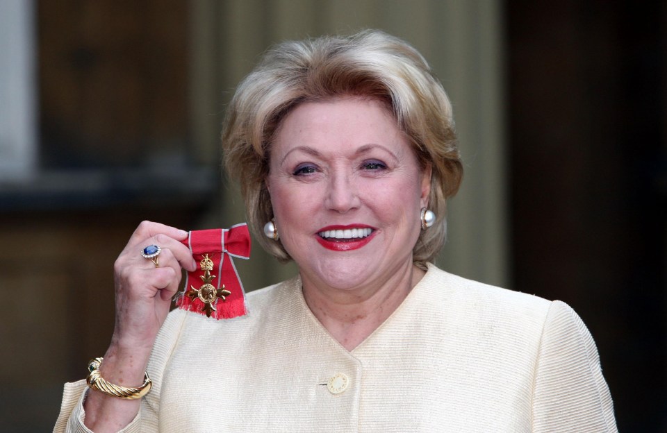 Proud Barbara with her OBE at Buckingham Palace in 2007