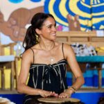 Meghan Markle playing a drum in Colombia