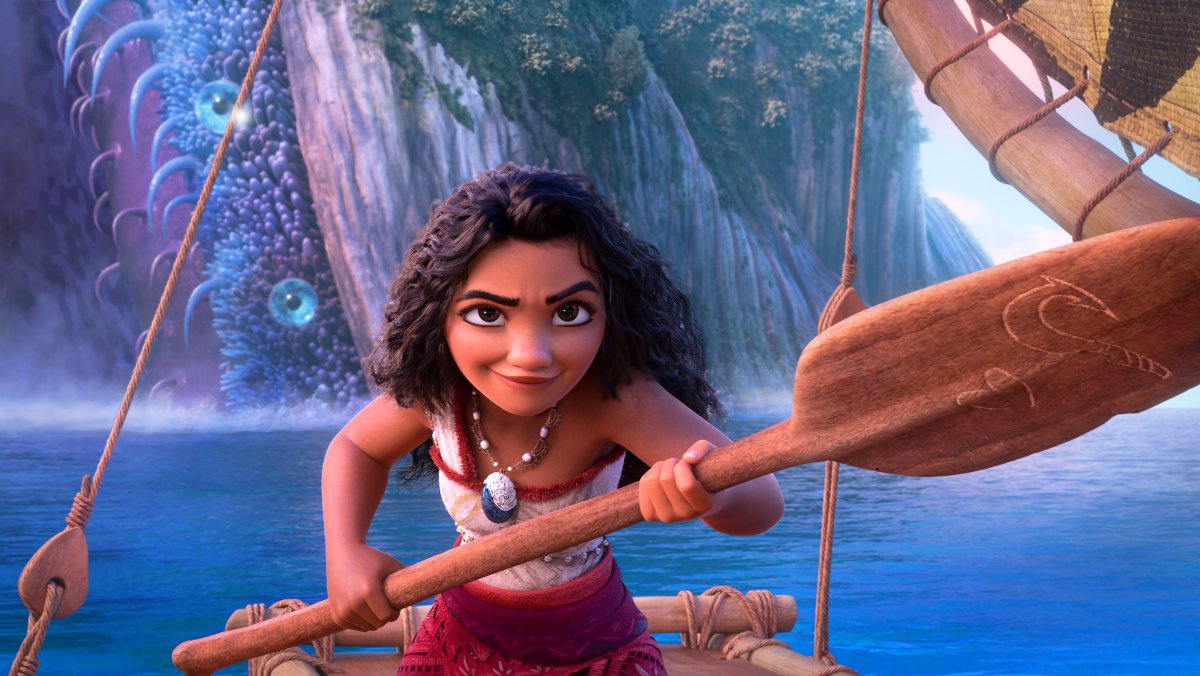 Moana holding an oar on a boat in an image from Moana 2