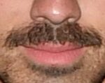 By Joe: There are plenty of men who’d ask What A Man Gotta Do to cut a dash like this US singer with his winning ’tache. Eating Cake By The Ocean may help