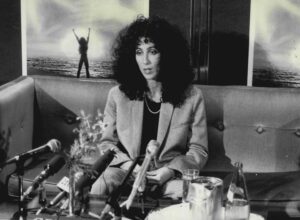 Cher, pictured during a 1985 press conference for "Mask" after winning her Cannes trophy.