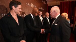 denzel washington shaking hands with king charles