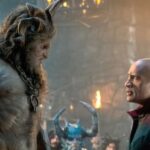 Krampus (played by Kristofer Hivju) towers over Dwayne Johnson in a still from 'Red One'.