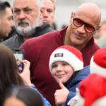 dwayne-johnson-embraces-crying-fan-takes-pictures-in-adorable-vid