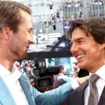 tom cruise and glen powell embracing