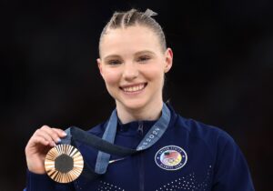 Gymnast Jade Carey in Two-Piece Workout Gear is "Back in the Orange and Black"