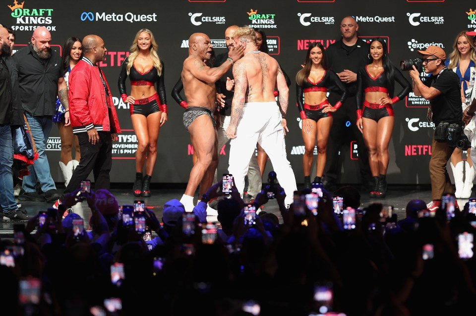 Mike Tyson slapped Jake Paul when they met on stage for the weigh-ins ahead of their fight