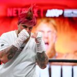 Jake Paul wears a rooster cap ahead of his fight with Mike Tyson