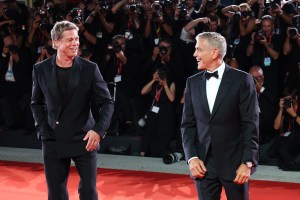 Brad Pitt and George Clooney on the 2024 Venice Film Festival red carpet for the world premiere of Wolfs