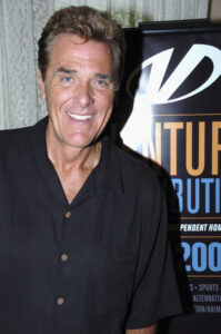 Legendary Wheel of Fortune presenter Chuck Woolery dies aged 83 after TV star 'fell suddenly ill' at his Texas home