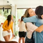 Shot of a woman greeting and welcoming her friend at party