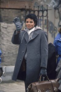 Popular American musician Michael Jackson (1958 - 2009) waves during the filming of the long-form music video for his song 'Bad,' directed by Martin Scorsese, New York, New York, 1987.  (Photo by Vinnie Zuffante/Getty Images)