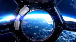 view of earth from porthole on international space station