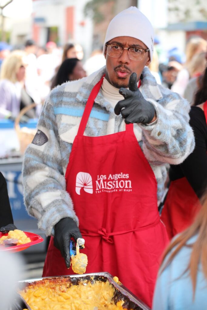 Nick Cannon serves food Wednesday at the Los Angeles Mission's 88th Thanksgiving Celebration. At the event, he told People magazine about his recent diagnosis of narcissistic personality disorder.