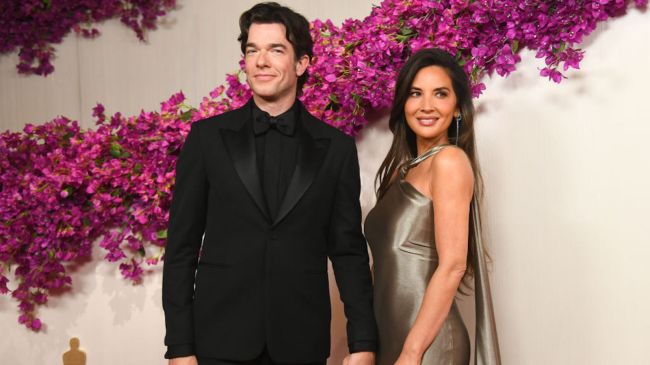 olivia munn and john mulaney holding hands