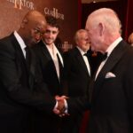 Denzel Washington meets King Charles III as Paul Mescal stands to his left as they attend the Royal Film Performance and Global Premiere of "Gladiator 2" on Nov. 13 in London.