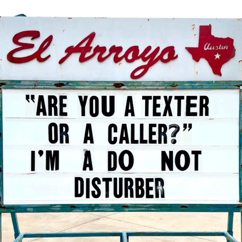 hilarious El Arroyo ATX sign about texting and calling