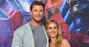 Chris Hemsworth and Elsa Pataky with their pet snake at home