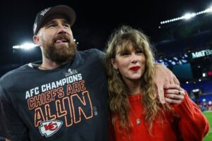 Travis Kelce celebrates his January AFC Championship win with girlfriend Taylor Swift. The football player shared a list of his top Swift tracks during a recent episode of "New Heights," his podcast with brother Jason Kelce.