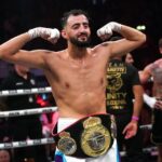 Slim Albaher celebrating his victory in the light-heavyweight bout against Tom Zanetti at the OVO Arena Wembley, London