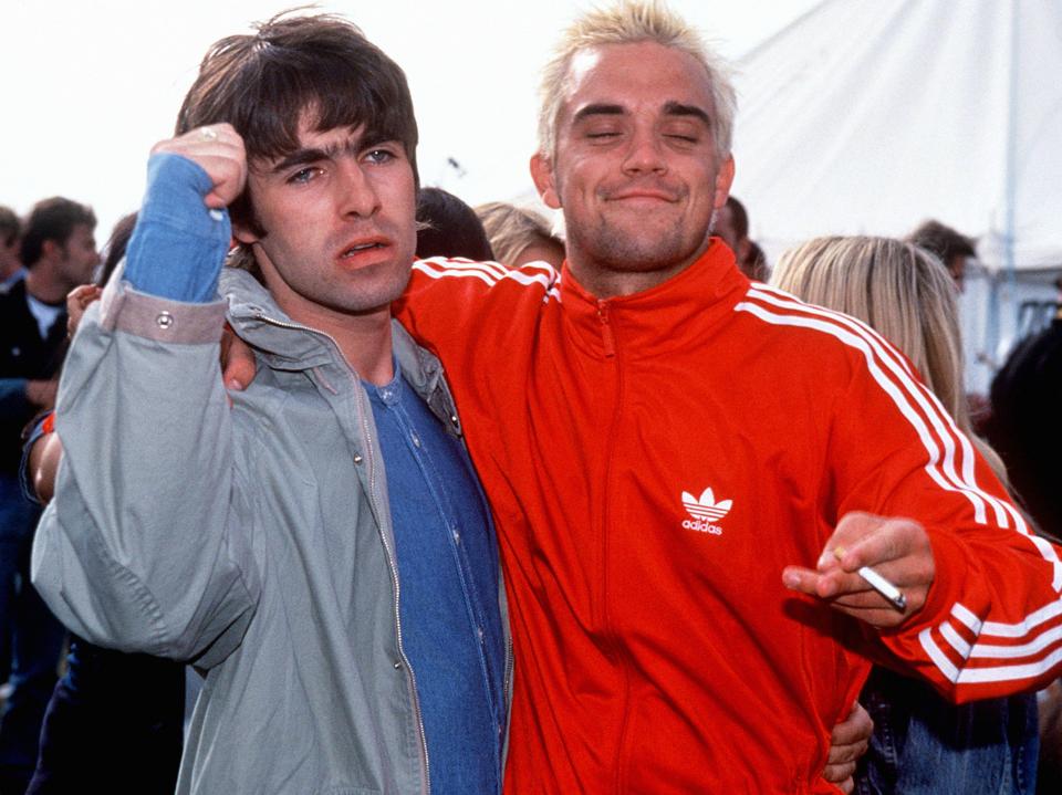 Robbie with Oasis hellraiser Liam Gallagher in 1995