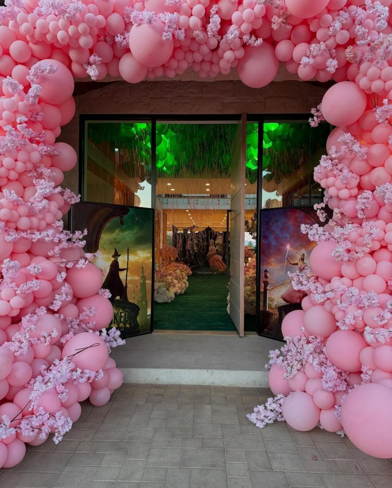 From rainbow arches to floral decor, no expense was spared for the event