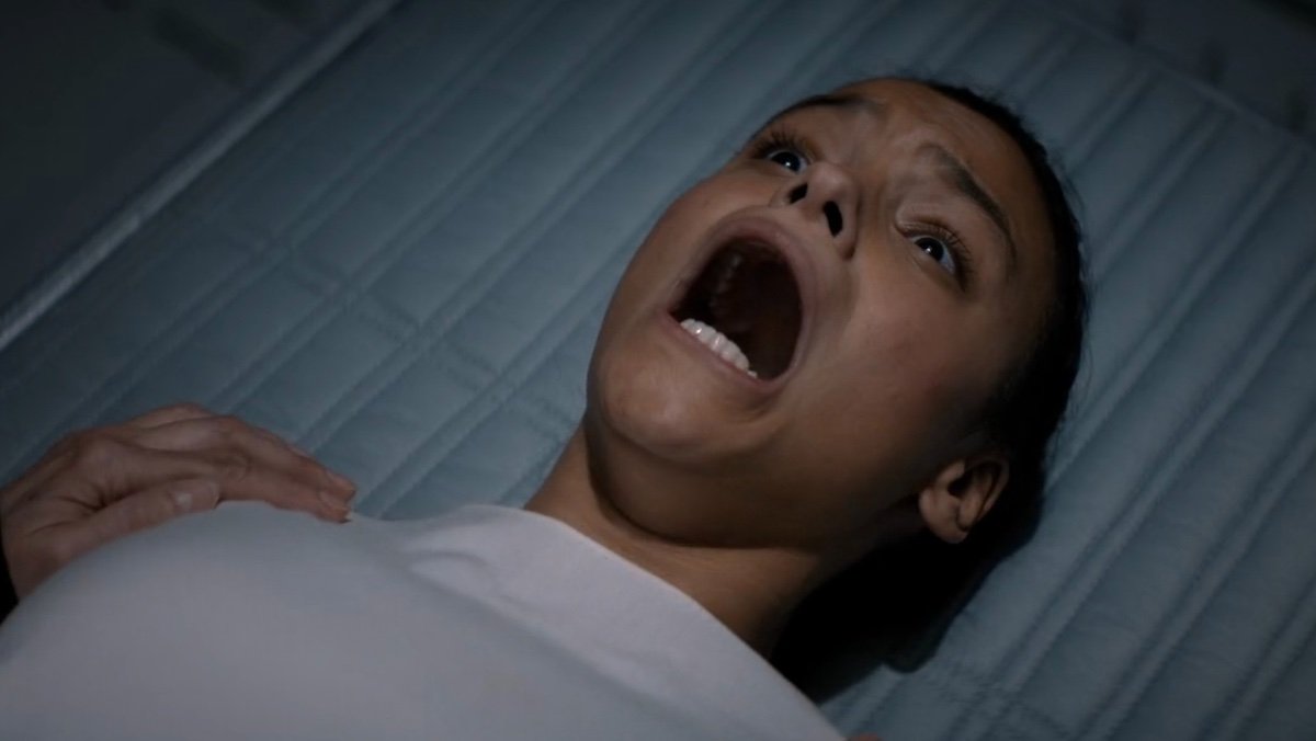 Lila screaming on a hospital bed at the start of the Agony on Dune: Prophecy