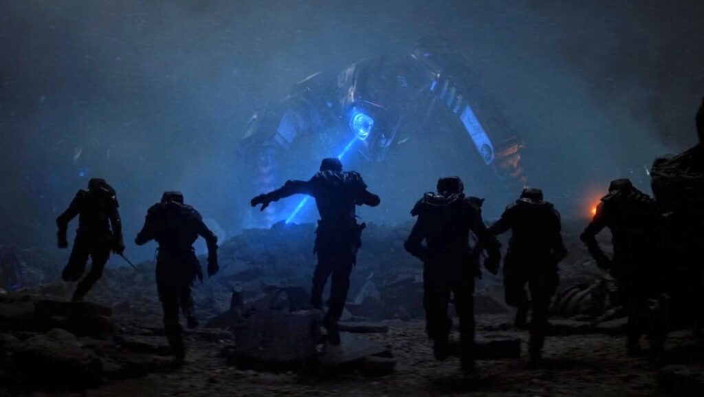 A giant robot shoots a laser at rushing soldiers on Dune: Prophecy