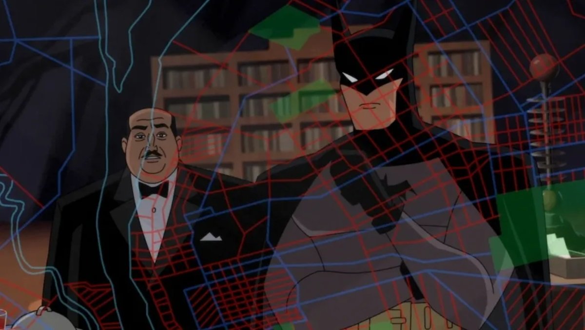 Batman and Alfred in the Batcave in Batman: Caped Crusader.