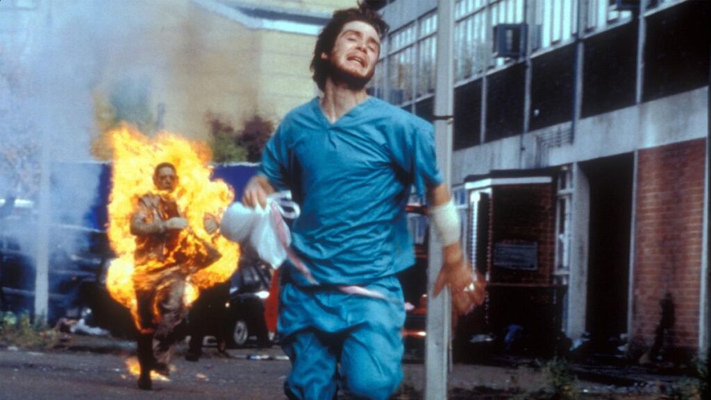 cillian murphy as 28 days later character jim running from man on fire